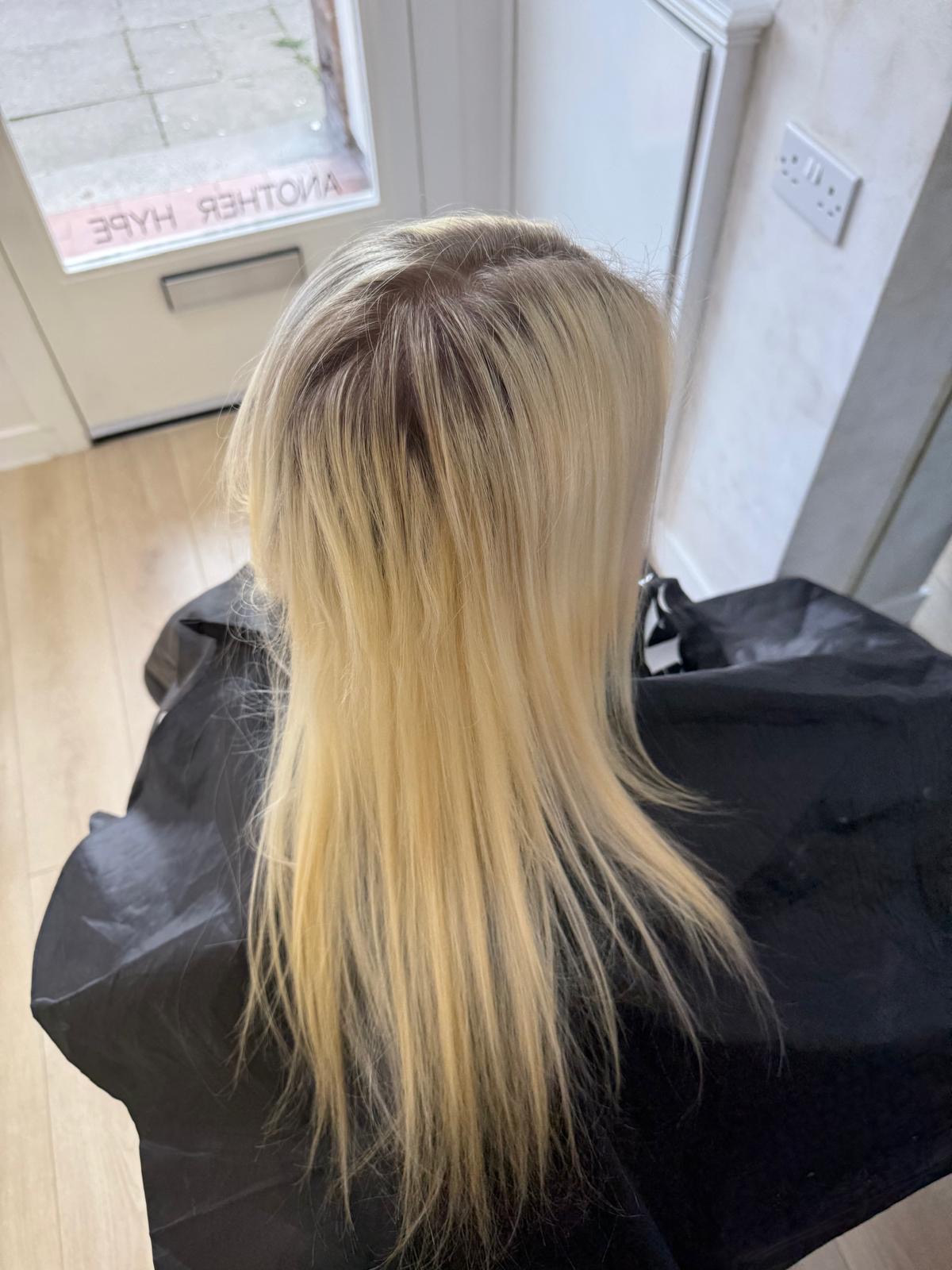 Warm yellow toned blonde hair before correction